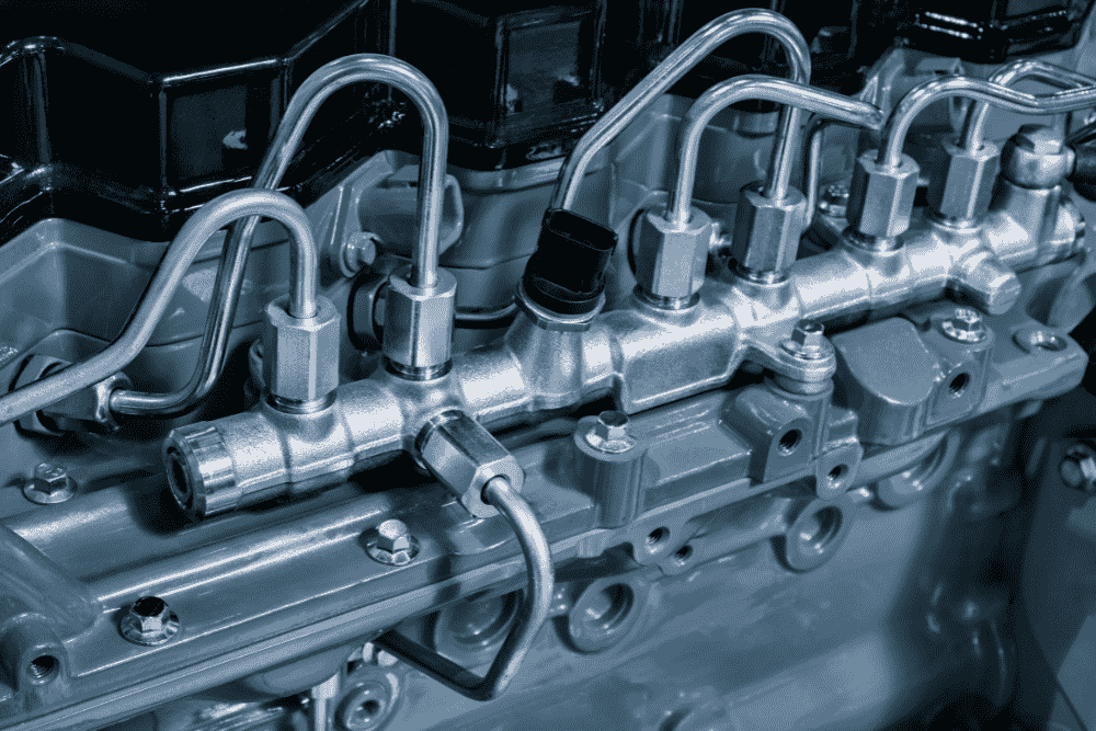 Injection Pump Replacement in Wasilla, AK - 1023 Diesel & Fleet, Black diesel engine. Fragment of a diesel motor close-up.